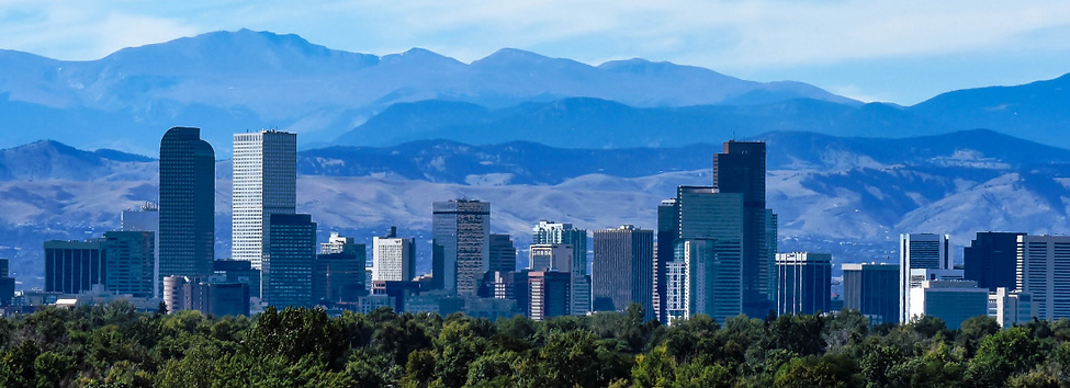 Denver Skyline with Rocky Mountains in the distance
