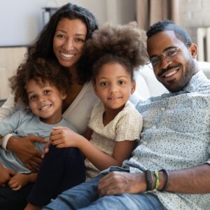 Happy family with 2 young kids